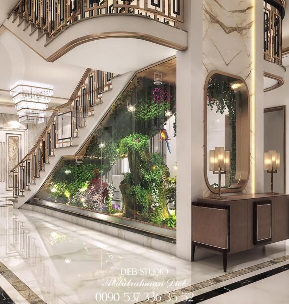 Luxurious entrance hall with a grand staircase.