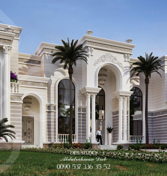 Luxurious villa with a classic architectural style, featuring a central fountain and a lush lawn.