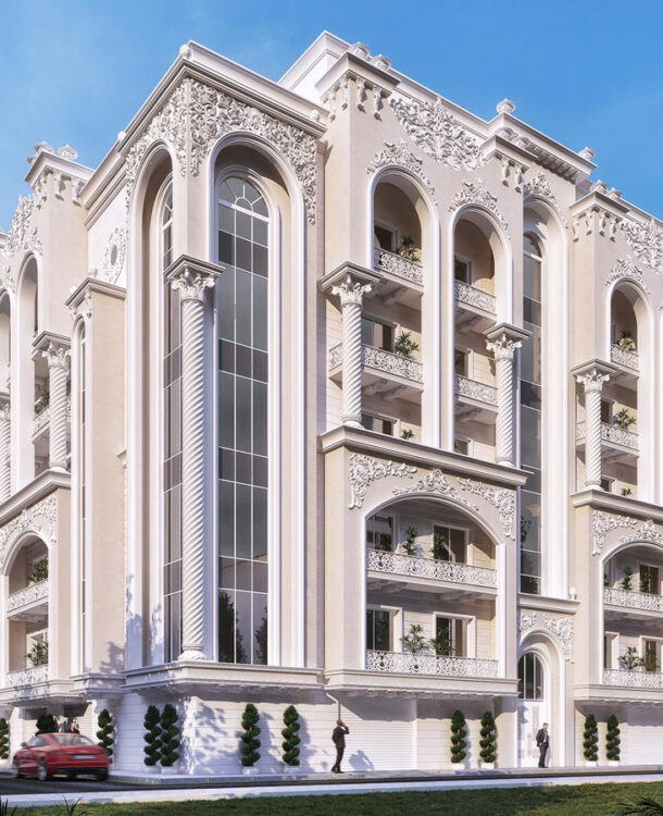 A classic, multi-story building with a symmetrical facade, featuring arched windows, ornate columns, and decorative balconies.