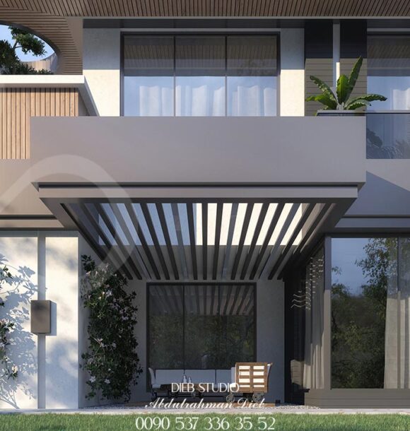 Modern two-story villa with a flat roof, large windows, and a balcony overlooking a palm tree-lined street.