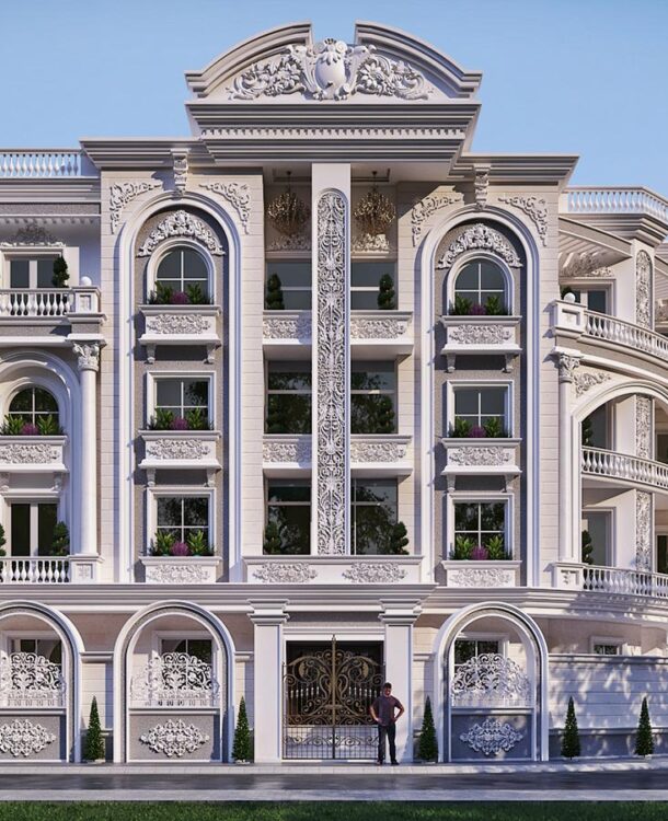 A classic, multi-story building with a symmetrical facade, featuring arched windows, ornate columns, and decorative balconies.