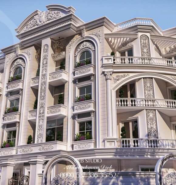 A classic, multi-story building with a symmetrical facade, featuring arched windows, ornate columns, and decorative balconies.