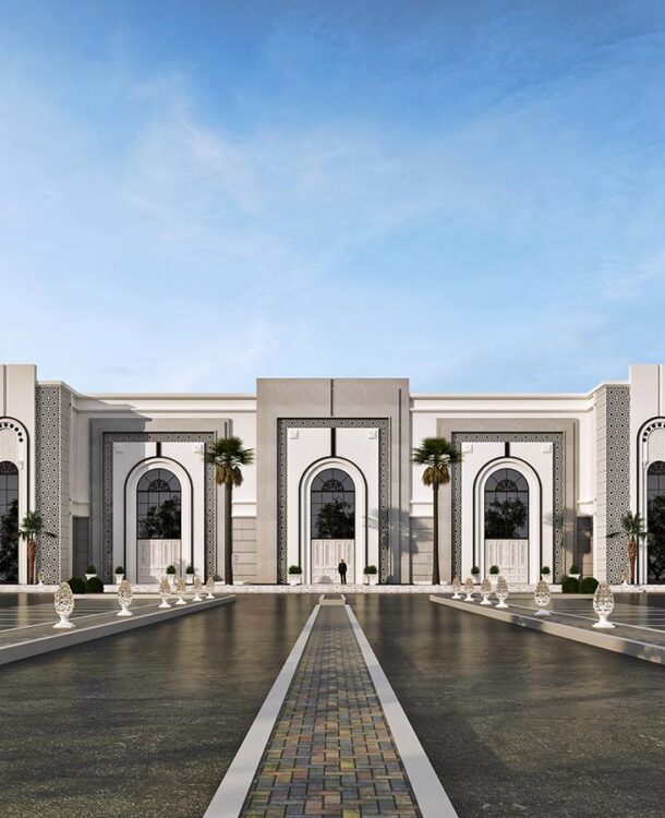 A modern building with a grand entrance and symmetrical design.